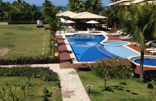 Itacimirim Apartment | 3 SUITES WITH AIR CONDITIONING, WIFI, COMFORT, SECURITY, SWIMMING POOLS, SEA VIEW.