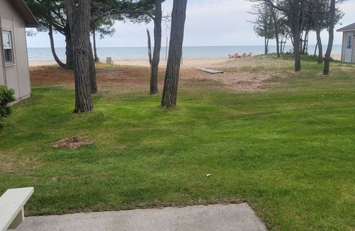Oscoda Resort | #3 Thomas' Parkside Cottages, 2BR suite, private patio w/Lake Huron views.