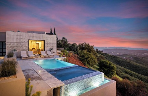 Mission Canyon House | 360 Views at Spyglass a modern masterpiece with an Infinity Pool