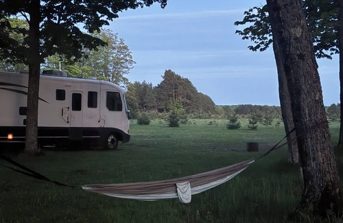 McMillan House | 38 ft Holiday Rambler RV with full hookups electric wifi everything you need.