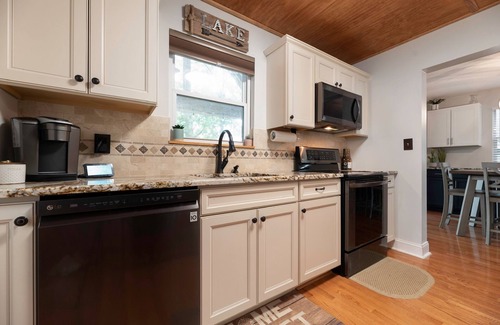 Mount Gilead House | 4 bd Lakefront Oasis with Hot Tub, Dock, FirePits, Blackstone grill, & lake toys