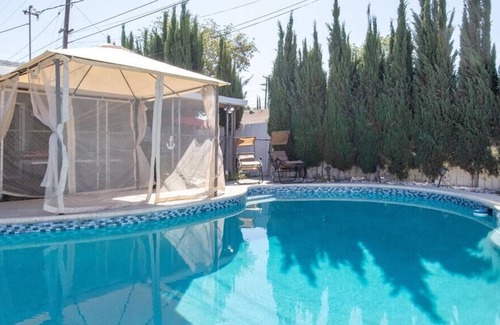 Riverside House | 4 Bed Home with Pool, Bar Area and Gym equipment