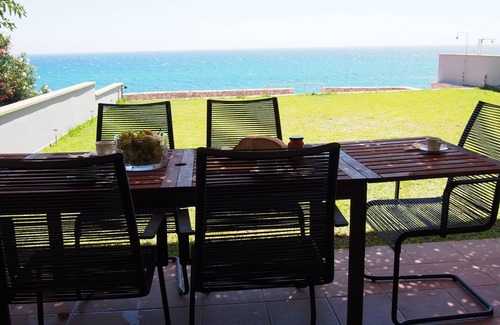 Ag. Georgios House | 4 bedroom house for 8 guests with seaview and direct access to the beach.