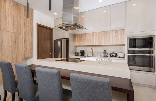 Tamarindo Condo | 4 Bedroom Stylish Condo Steps to the Beach