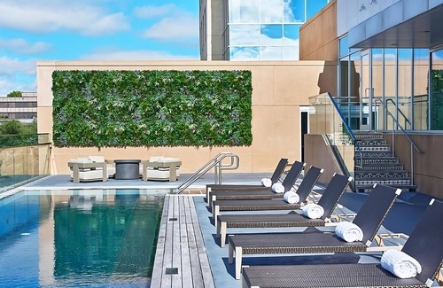 West Plaza Hotel | 4 Convenient Units! Pool, Pets Allowed, Near Kemper Museum of Contemporary Art!
