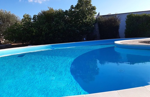 Cisternino Apartment | 4 person, 1st floor appt. Shared, wonderful 9 m. terrace, pool and tennis crt.