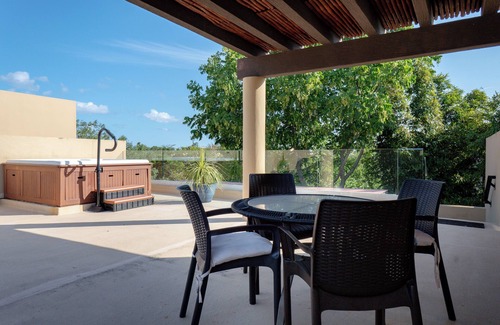 Playacar Condo | 4 Pools and Budget Penthouse in Vaiven. From BRIC Vacation Rentals