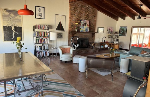 Sandia Ridge House | 40 MIN BIKE TO BALLOON FIESTA! Quirky MCM home with hot tub!