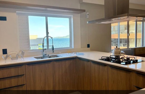 Itapema Apartment | 401 Renovated beachfront apartment with 4 bedrooms