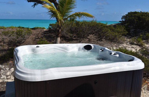 Great Exuma House | 4acres ON beach no drive 4 bedroom pool hot tub gym 3.5 baths 3+3outdoor showers