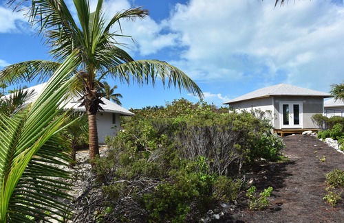 Great Exuma House | 4acres ON beach no drive 4 bedroom pool hot tub gym 3.5 baths 3+3outdoor showers