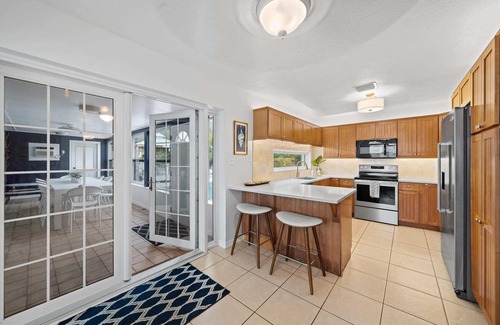 Cocoa Beach House | 4Bed/3Bath Heated Pool w/Tiki Bar, Steps to Beach!