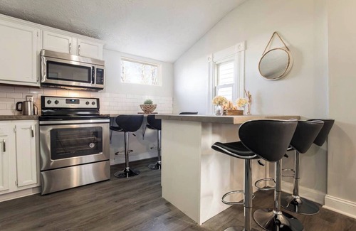 Shelby Park House | 4BR/2BA Spacious Louisville Getaway by CozySuites