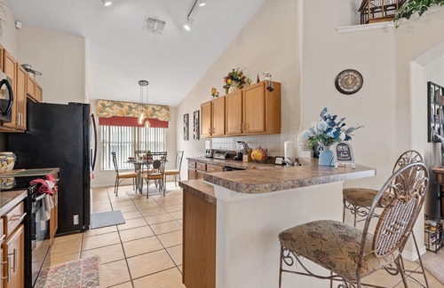Liberty Village Villa | 4BR/3Bath Home, pool/spa, game room, lake view. Closer to ALL ATTRACTIONS