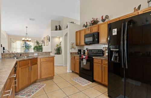 Liberty Village Villa | 4BR/3Bath Home, pool/spa, game room, lake view. Closer to ALL ATTRACTIONS