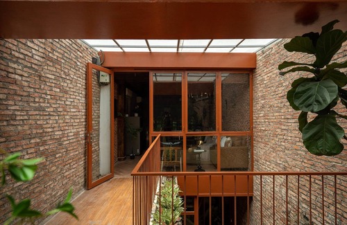 Downtown Ho Chi Minh City House | 4BR Industrial Gem with Rooftop Garden by Bến Thành