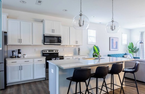 Clayton House | 4Br Sleeps 10 w/Fenced Yard & Movie Room - Modern Home near Downtown Clayton