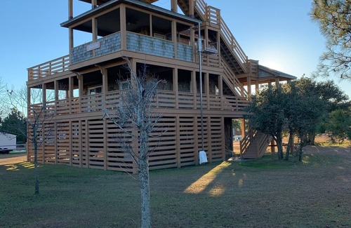 Carova Beach House | 4X4 only! Canal front. Ocean AND sound views! Decks and porches on all levels.