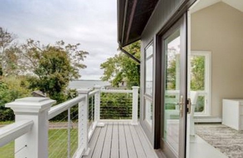Southold House | 5 Bedrooms ~ Steps from a Private Sandy Beach and Beautiful Vineyard Views.