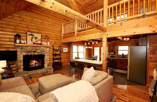 East Jordan Cabin | 5 BR log cabin - 40 private acres - Hiking trails