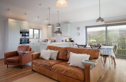 Bantham House | 5* cosy, dog-friendly holiday cottage with exceptional views of nearby beach