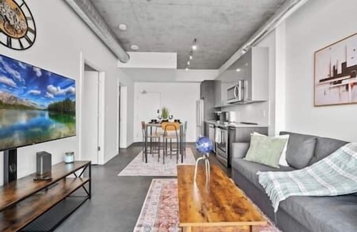 East Village Apartment | 5 min Walk to Stampede | King Bed | Sofa Bed | AC