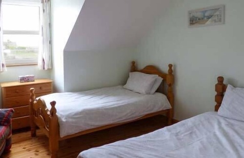 Carrigaholt Cottage | 5 RINEVILLA VIEW, pet friendly, with open fire in Cross, County Clare