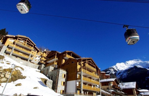 Champagny-en-Vanoise Apartment | 50m from ski slopes, 10th floor, balcony, parking, tv, ski locker, 55m², Champagny-en-Vanoise