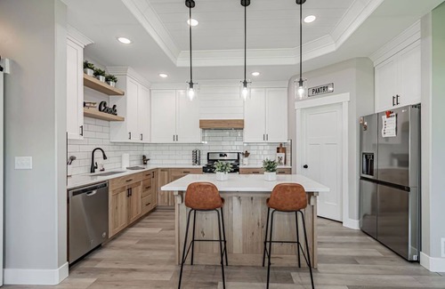 Idaho Falls House | 6 bed 3 bath home ~ sleeps 20! w/game room, fireplace, hot tub & playground.