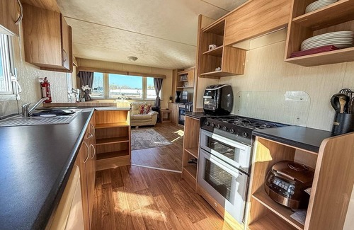 Hunstanton House | 6 berth caravan for hire with decking at Manor Park in Norfolk ref 23017S