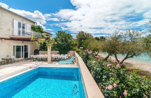 Mirce Villa | 7-BR Beachfront Villa with Seaside Terrace and Heated Swimming Pool