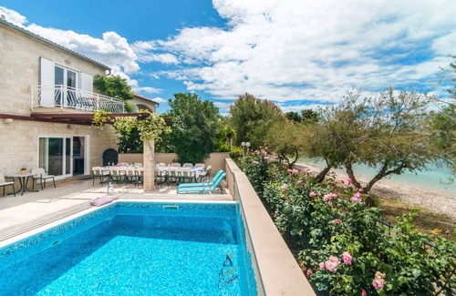 Mirce Villa | 7-BR Beachfront Villa with Seaside Terrace and Heated Swimming Pool