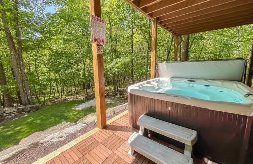 Mountainside House | 7 mins to Wisp New Hot tub Modern Cabin with Huge Media Room Fire Pit