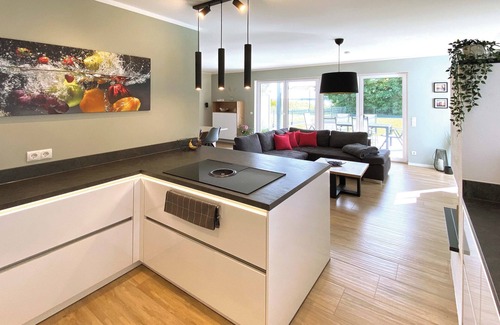 Pouch House | 8P Holiday home "Seegelblick" in the first row of the lake with sauna, fireplace & wallbox