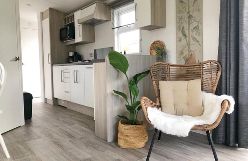 Sint Maarten House | A beautiful and brand new chalet with large terrace, fully fenced garden, private parking, central heating and free WIFI.