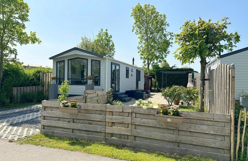 Sint Maarten House | A beautiful and brand new chalet with large terrace, fully fenced garden, private parking, central heating and free WIFI.