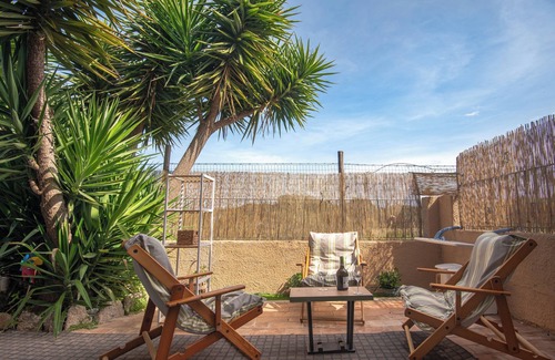 Olbia Apartment | A beautiful nest, an elegant design, attention to detail, and a wonderful yard.