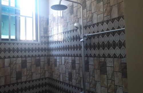 Dar es Salaam Cabin | A bed and breakfast, a real home away from home