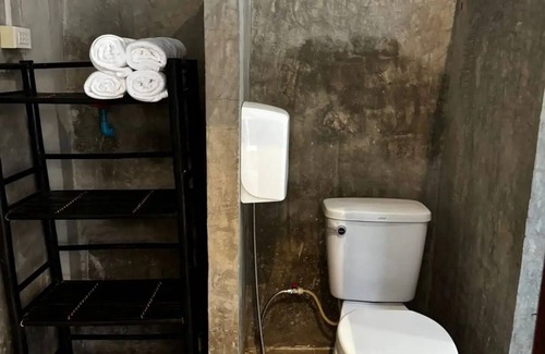 Luang Prabang Apartment | A bedroom in a local area!