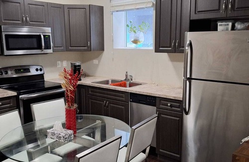 Saskatoon Apartment | A blend of comfort and convenience in this cozy, modern 2-bd basement suite.
