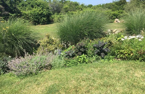 New Shoreham House | A Block Island landmark with historic charm, gardens, long water views
