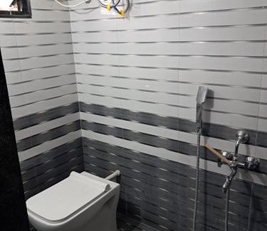 Daman House | A C Room For Couple with Refrigerator, Microwave, RO Water