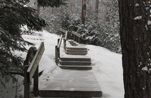 Eveleth House | A charming home on a beautiful peninsula on a crystal clear lake.