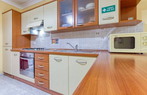 Bugibba Apartment | A colourful 3BR home, with Smart TV & Balcony