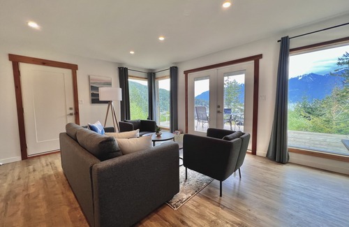 Bowen Island Bed & Breakfast | A cozy guest suite with a panoramic ocean view facing the Howe Sound Mountain