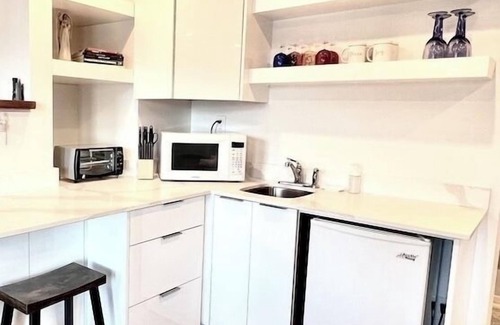 Bowen Island Bed & Breakfast | A cozy guest suite with a panoramic ocean view facing the Howe Sound Mountain