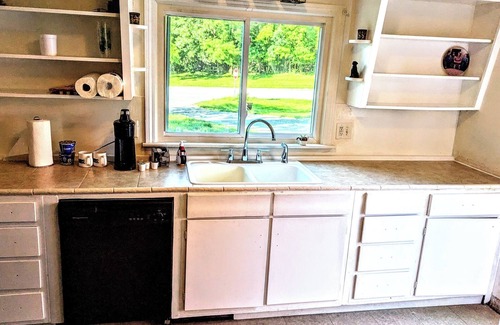 Pottawattamie Park House | A cozy little house along Trail Creek awaits you. Relax. Unwind. Enjoy.