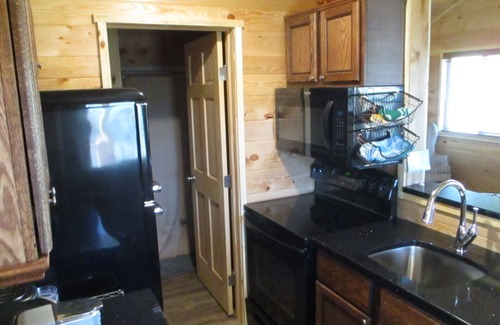 Carbon Hill Cabin | A cozy new cabin in rural setting with a hot tub on porch. Beautiful rural view.