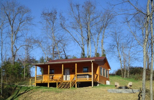Carbon Hill Cabin | A cozy new cabin in rural setting with a hot tub on porch. Beautiful rural view.