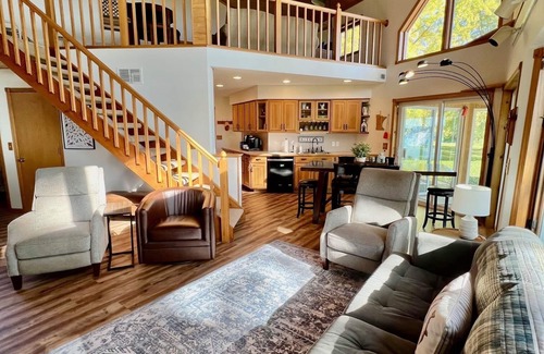 Cokato Cabin | A Creek Runs Through It & Garage Great Room